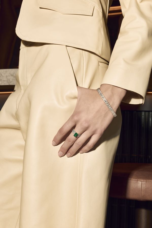 High Jewelry: an emerald ring, worn