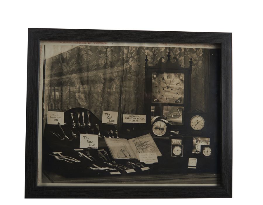 A shop window of clocks and watches